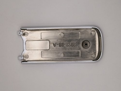 Zaślepka banku baterii zamka Adel 5500 srebrny